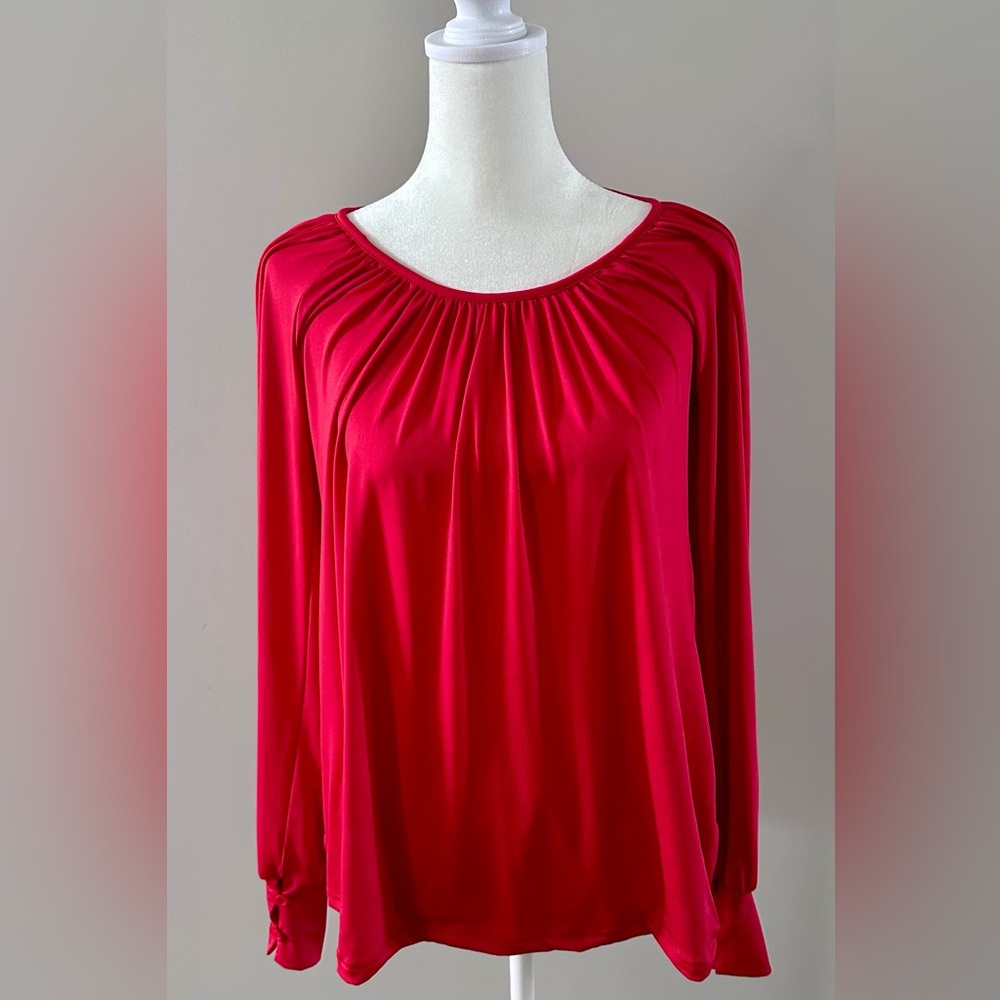 Women’s size small, red top.